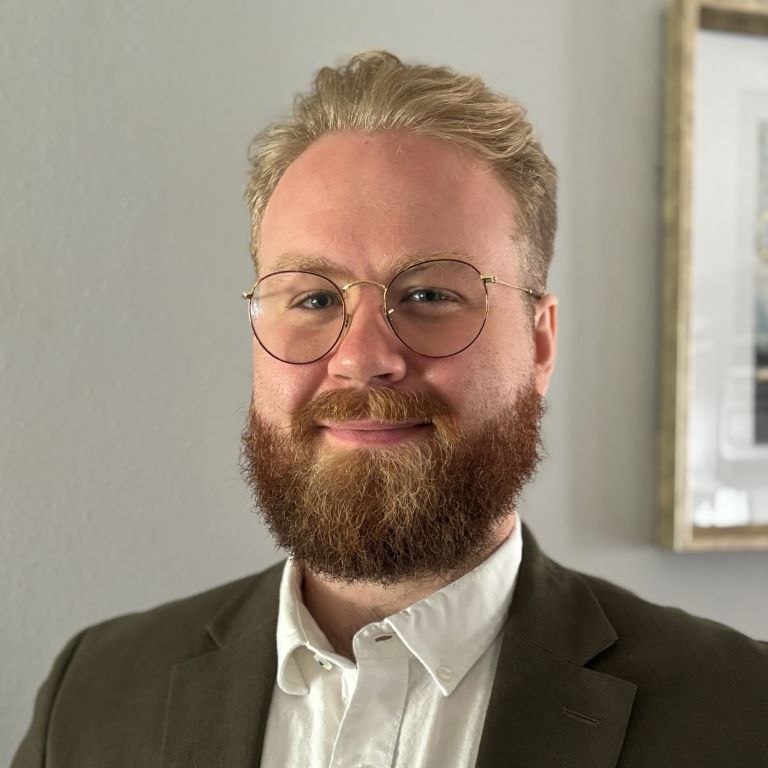 Headshot of Devin Good.